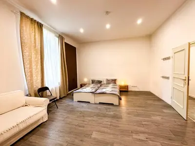 Ein Bett oder Betten in einem Zimmer der Unterkunft Ferienwohnungen Grabbeallee #1