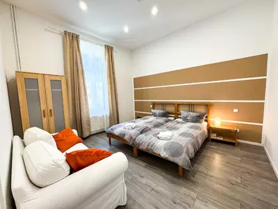 Ein Bett oder Betten in einem Zimmer der Unterkunft Ferienwohnungen Grabbeallee #1