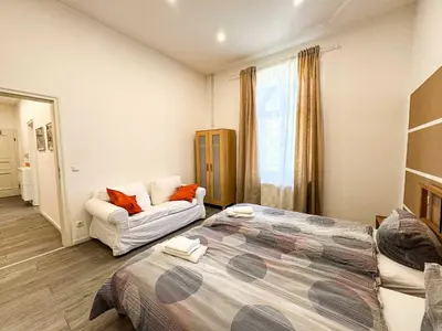 Ein Bett oder Betten in einem Zimmer der Unterkunft Ferienwohnungen Grabbeallee #1