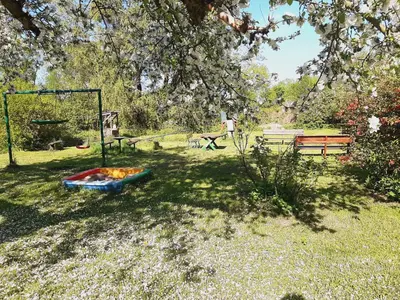 Ein Kinderspielbereich in der Unterkunft Die Malche Gäste und Tagungshaus Villa App 13