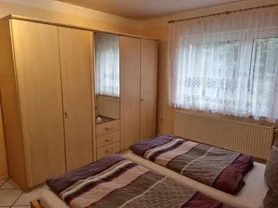 Ein Bett oder Betten in einem Zimmer der Unterkunft FeWo Schütz