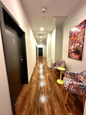 Ein Sitzbereich in der Unterkunft Hotel FFA 62