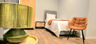 Ein Bett oder Betten in einem Zimmer der Unterkunft Hotel FFA 62