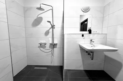 Ein Badezimmer in der Unterkunft Hotel FFA 62
