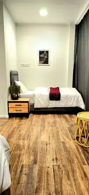Ein Bett oder Betten in einem Zimmer der Unterkunft Hotel FFA 62