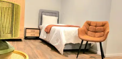 Ein Bett oder Betten in einem Zimmer der Unterkunft Hotel FFA 62
