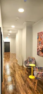 Ein Sitzbereich in der Unterkunft Hotel FFA 62