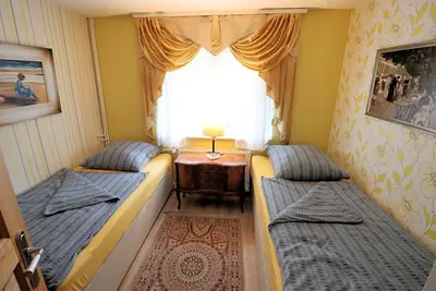 Ein Bett oder Betten in einem Zimmer der Unterkunft Berlinurlaub im Grünen, 6 Betten, Pool, Sauna, Spielplatz, Grill, Tischtennis