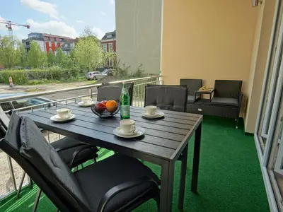 Ein Balkon oder eine Terrasse in der Unterkunft HOGULU - 3 - RAUM - App 25 mit Balkon