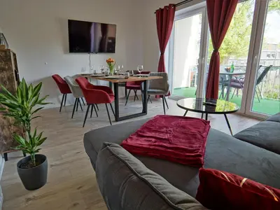 Ein Sitzbereich in der Unterkunft HOGULU - 3 - RAUM - App 25 mit Balkon