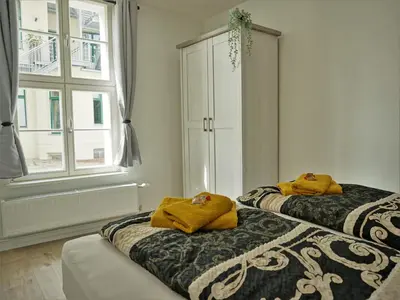 Ein Bett oder Betten in einem Zimmer der Unterkunft Hogulu - 2- RAUM - App 2