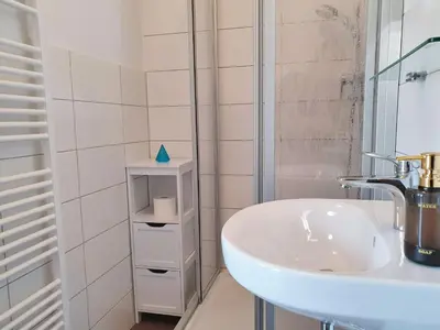 Ein Badezimmer in der Unterkunft Hogulu - 2- RAUM - App 2