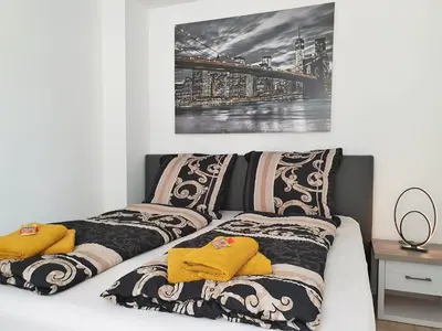 Ein Bett oder Betten in einem Zimmer der Unterkunft Hogulu - 2- RAUM - App 2