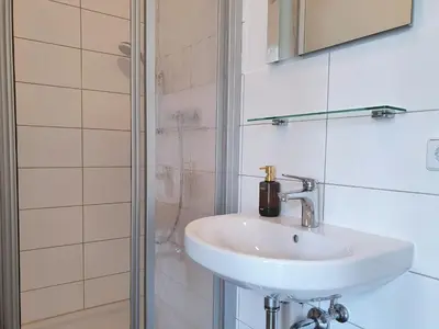 Ein Badezimmer in der Unterkunft Hogulu - 2- RAUM - App 2
