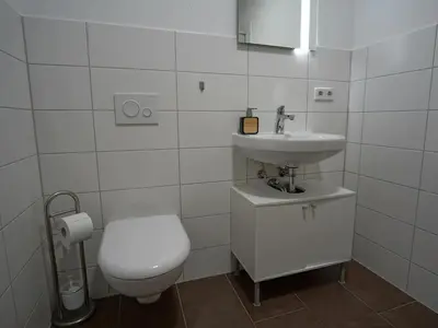 Ein Badezimmer in der Unterkunft Hogulu - 2 - RAUM - App 4
