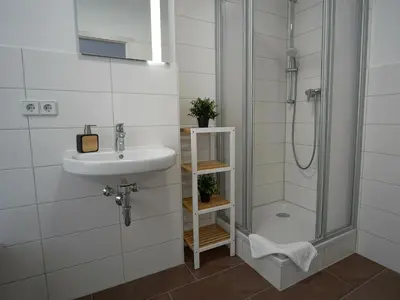 Ein Badezimmer in der Unterkunft Hogulu - im Herzen der Altstadt Appartement 3