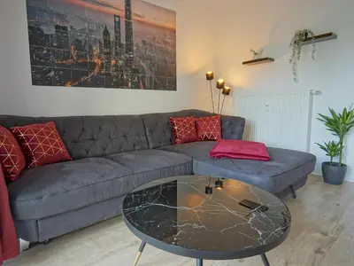 Ein Sitzbereich in der Unterkunft Hogulu - 3 - RAUM - App 27 mit Balkon direkt im Zentrum