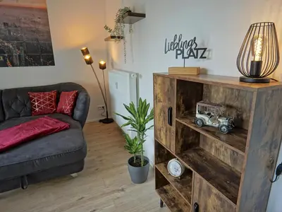 Ein Sitzbereich in der Unterkunft Hogulu - 3 - RAUM - App 27 mit Balkon direkt im Zentrum