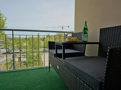 Ein Balkon oder eine Terrasse in der Unterkunft Hogulu - 3 - RAUM - App 27 mit Balkon direkt im Zentrum