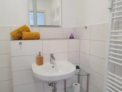 Ein Badezimmer in der Unterkunft Hogulu - ruhig gelegenes Appartement 22 in der Altstadt