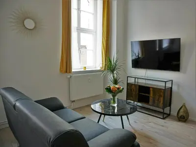 TV/Unterhaltungsangebot in der Unterkunft Hogulu - Rollstuhlfreundliches App 24