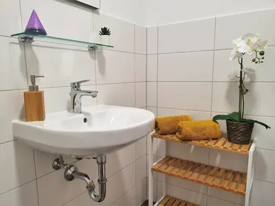 Ein Badezimmer in der Unterkunft Hogulu - unweit der Jahrtausendbrücke Appartement 8