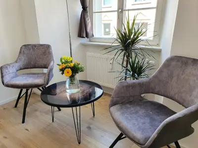Ein Sitzbereich in der Unterkunft Hogulu - unweit der Jahrtausendbrücke Appartement 8