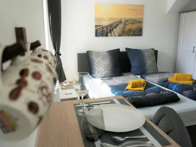 Ein Sitzbereich in der Unterkunft Hogulu - schickes Appartement 5 in der Altstadt