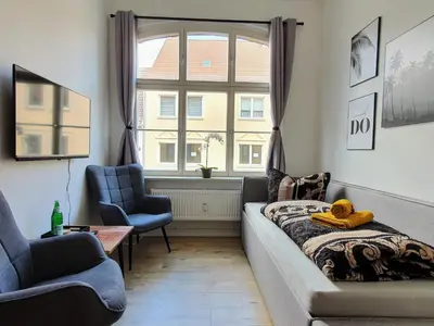 Ein Sitzbereich in der Unterkunft Hogulu - klein und fein in der Altstadt, Appartement 10