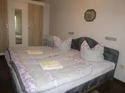Ein Bett oder Betten in einem Zimmer der Unterkunft Berlin Urlaub im Grünen