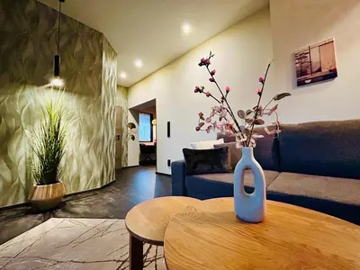 Ein Sitzbereich in der Unterkunft Deluxe Apartment im Grünen mit Balkon und Frühstück im Hotel Reindahls