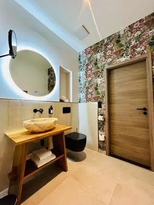 Ein Badezimmer in der Unterkunft Deluxe Apartment im Grünen mit Balkon und Frühstück im Hotel Reindahls