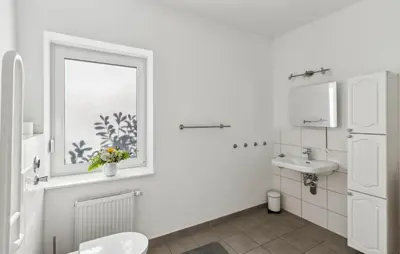 Ein Badezimmer in der Unterkunft Alpin 1