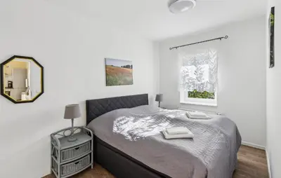 Ein Bett oder Betten in einem Zimmer der Unterkunft Klassisch