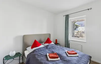 Ein Bett oder Betten in einem Zimmer der Unterkunft Alpin 2