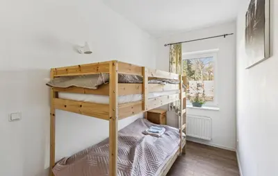 Ein Bett oder Betten in einem Zimmer der Unterkunft Cottage