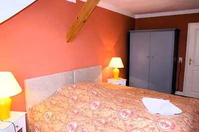 Ein Bett oder Betten in einem Zimmer der Unterkunft Hofensemble nahe Berlin