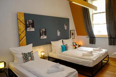 Ein Bett oder Betten in einem Zimmer der Unterkunft Berlin Roof&Chill Loft I OverTheTop 2-level I 170m2 I 2 Bäder I Bachelor I Familien I Gruppen I Events
