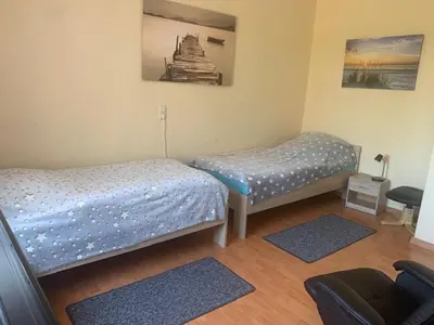 Ein Bett oder Betten in einem Zimmer der Unterkunft 1 Zimmer Wohnung in Trebbin mit PKW Stellplatz