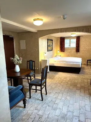 Ein Bett oder Betten in einem Zimmer der Unterkunft Gutshaus Lietzow