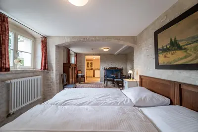 Ein Bett oder Betten in einem Zimmer der Unterkunft Gutshaus Lietzow