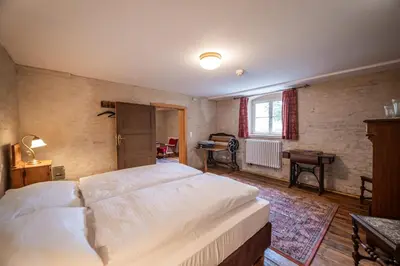 Ein Bett oder Betten in einem Zimmer der Unterkunft Gutshaus Lietzow