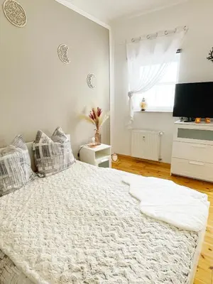 Ein Bett oder Betten in einem Zimmer der Unterkunft CityNest