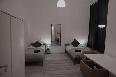 Ein Bett oder Betten in einem Zimmer der Unterkunft Modernes Zuhause im Zentrum von Schöneberg
