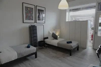 Ein Bett oder Betten in einem Zimmer der Unterkunft Modernes Zuhause im Zentrum von Schöneberg