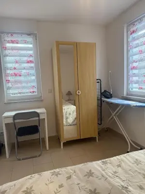 Ein Bett oder Betten in einem Zimmer der Unterkunft Gästewohnung Scharfe Lanke