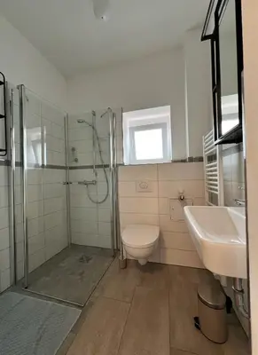 Ein Badezimmer in der Unterkunft Das Jaartn - Boardinghouse Appartements & Ferienwohnung