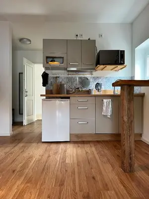 Küche/Küchenzeile in der Unterkunft Das Jaartn - Boardinghouse Appartements & Ferienwohnung