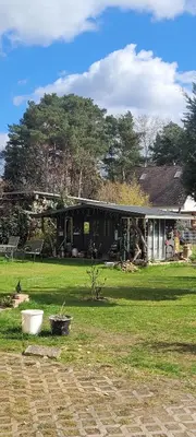 Ein Garten an der Unterkunft FeWo im Dahme-Seengebiet nahe Berlin