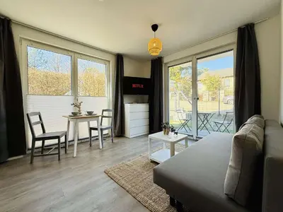 Ein Sitzbereich in der Unterkunft MontiRooms- Apartment nahe Berlin & Natur